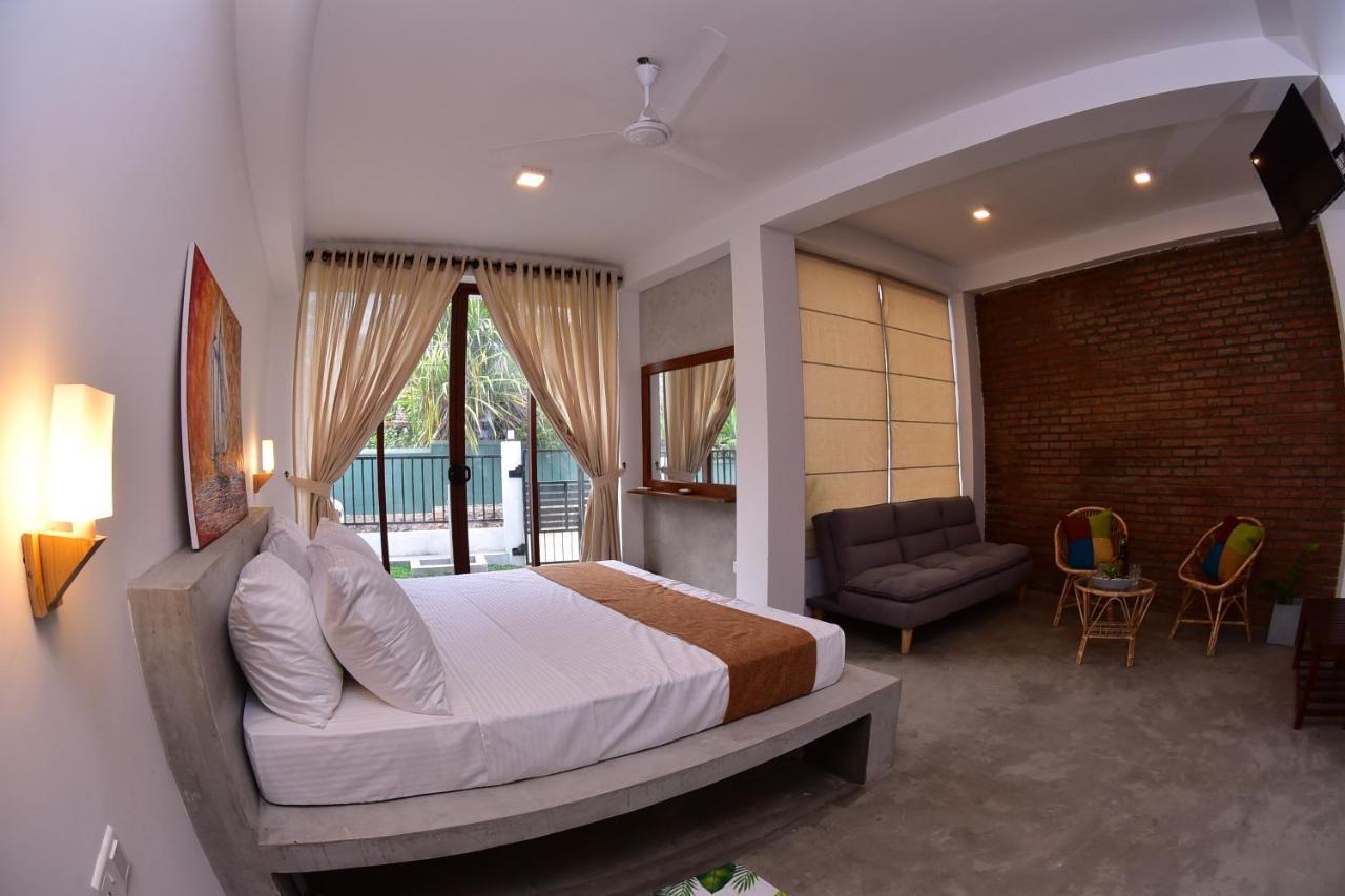Lily Holiday Apartments Hikkaduwa Buitenkant foto