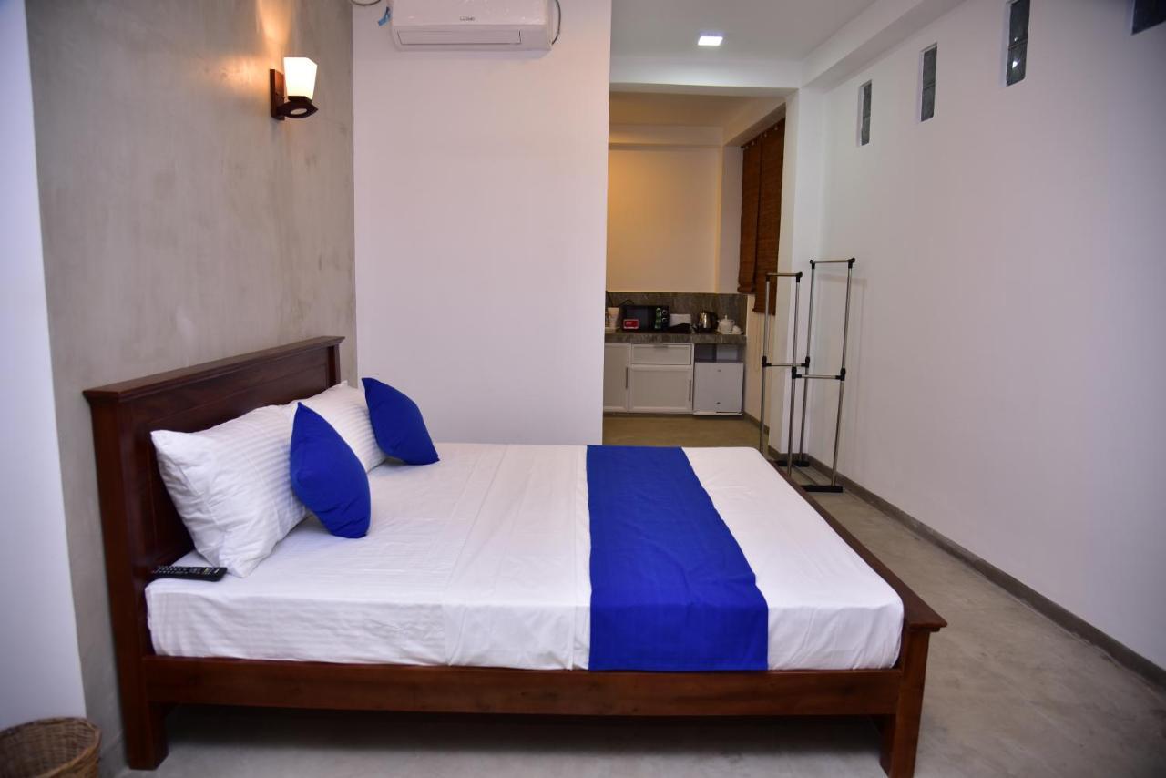 Lily Holiday Apartments Hikkaduwa Buitenkant foto