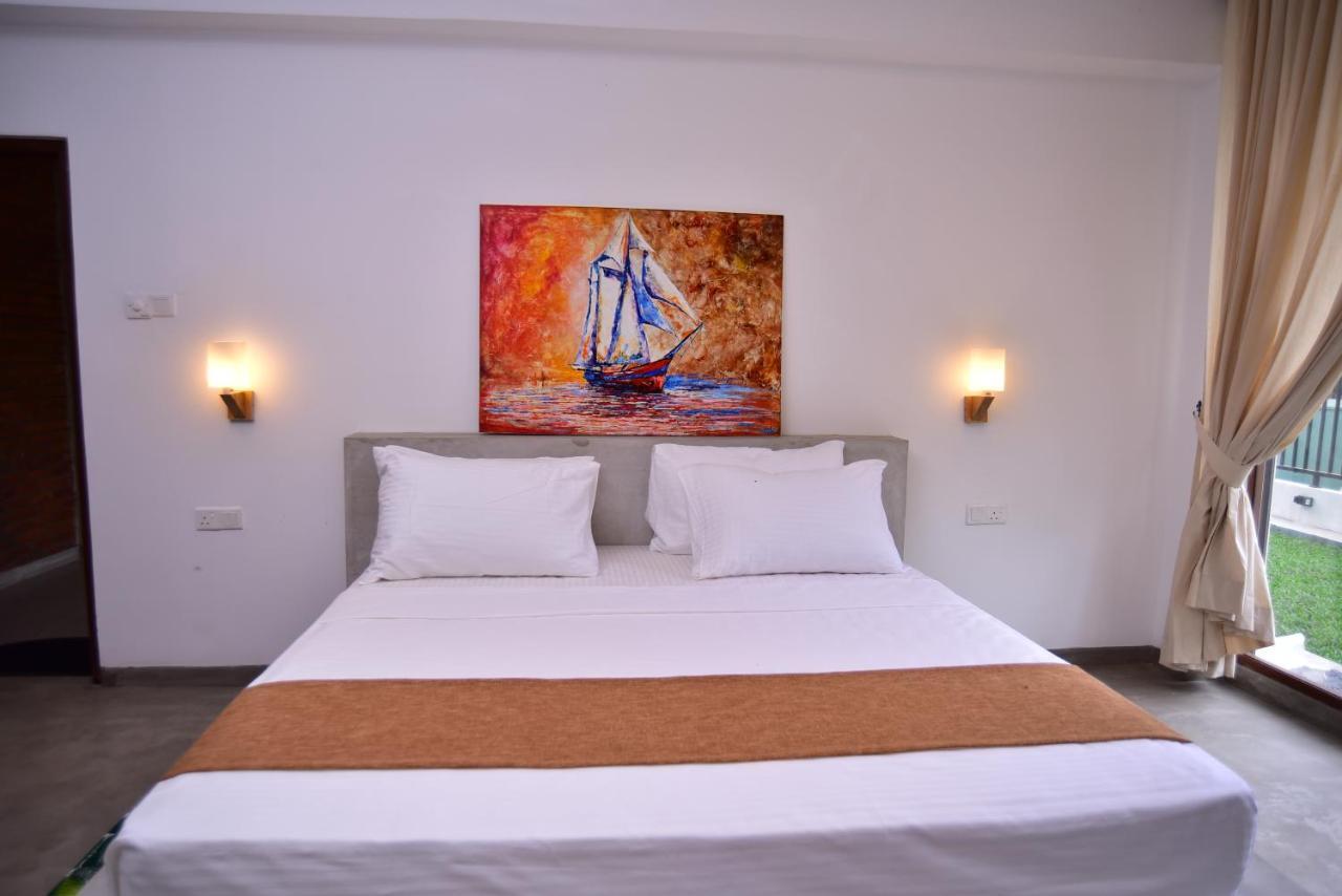 Lily Holiday Apartments Hikkaduwa Buitenkant foto